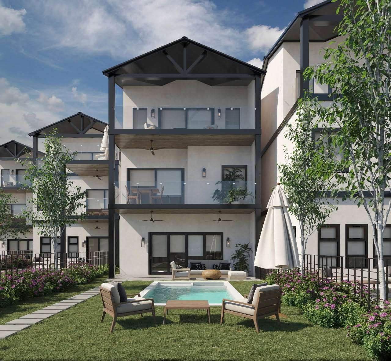 Front elevation of townhomes featuring private pool and outdoor living spaces
